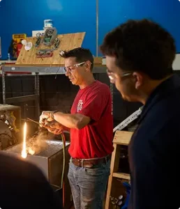Skilled-trades-student-with-instructor-hvac