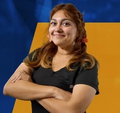 Smiling woman with crossed arms